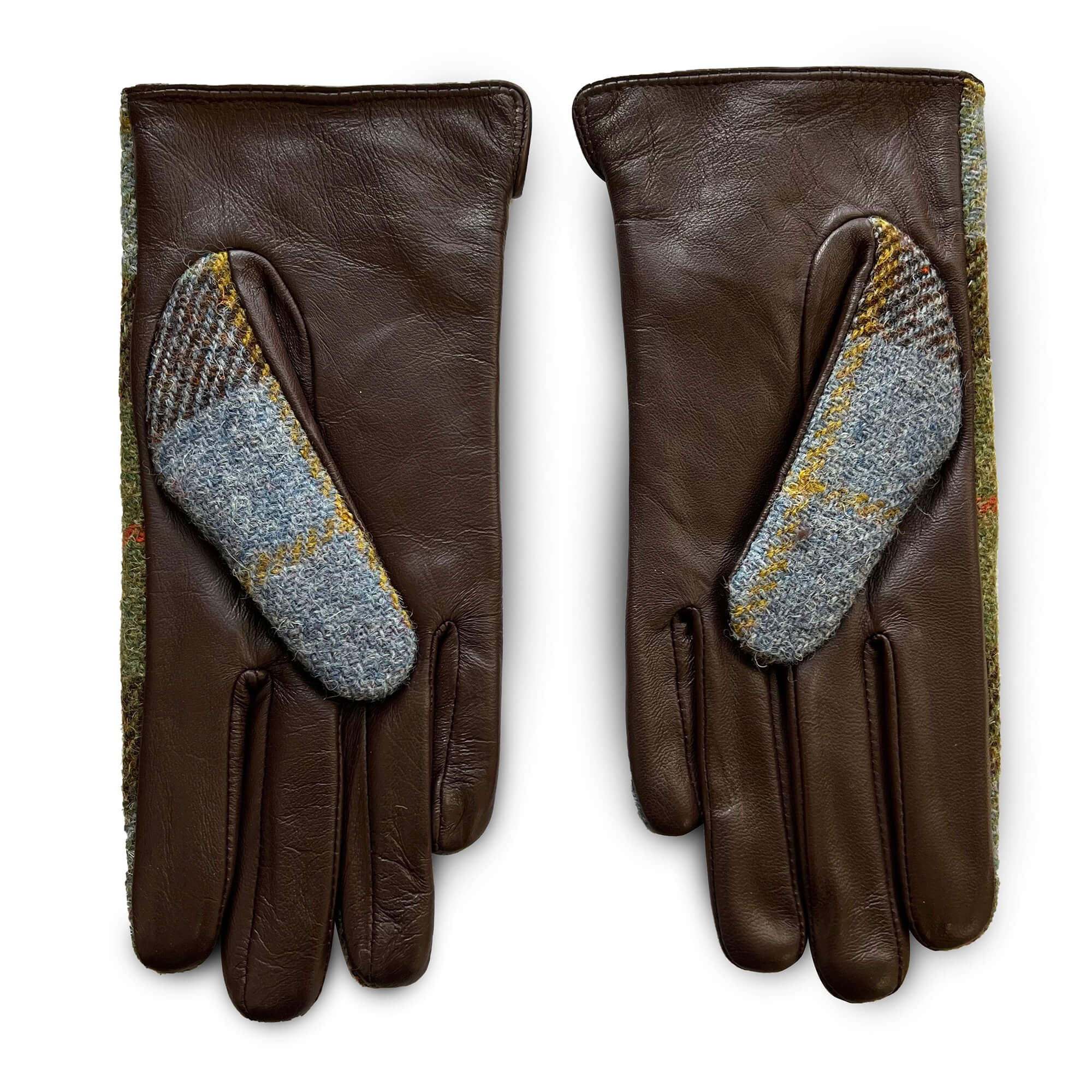 Back view of gloves with brown leather palms and wool tartan thumbs in soft blue and gold tones.