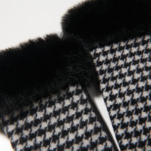 Ladies lambswool mittens in black & white dogtooth with a faux fur cuff.