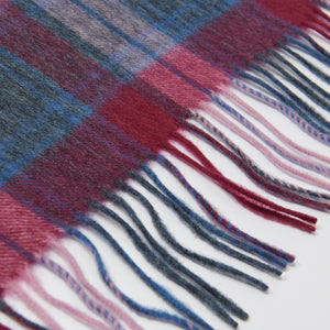 Soft fringed lambswool baby blanket in pink and blue tartan.