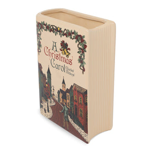 Angled view showing sculpted book pages and wide top opening of vase.
