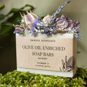 Front view of Lavender Dried Flower Olive Oil Soap with dried flowers on top