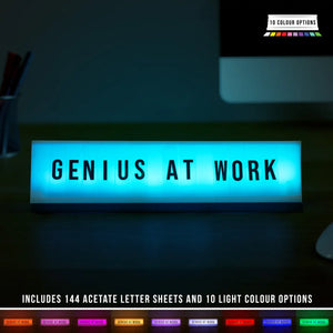 Customisable LED desk sign glowing in blue with 10 colour options visible below.