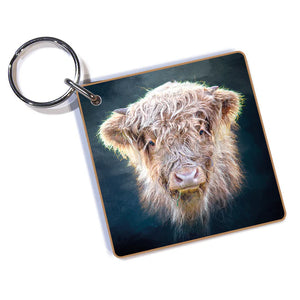 Little Highlander Highland Cow Keyring featuring a detailed digital artwork of a fluffy Highland cow, attached to a sturdy silver split ring.