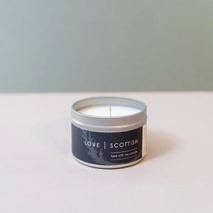 Love Scottish Lemongrass candle displayed against a soft sage backdrop, perfect for a calming and stylish setting.