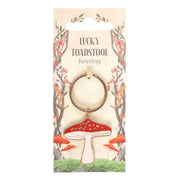Lucky Toadstool Keyring on illustrated woodland backing card with red mushrooms.