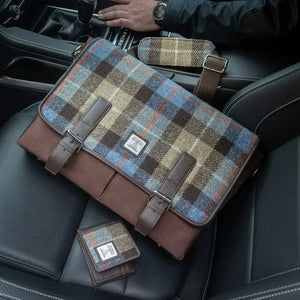 A picture of a similar style bag sitting on a car seat.