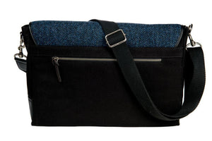 Blue Herringbone Harris Tweed Messenger Bag for men and women from the back showing the rear zipped pocket and shoulder strap.