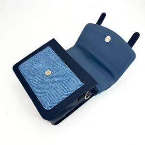 Open Sky Blue Harris Tweed handbag showing front slip pocket and magnetic closure.