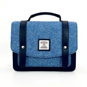 Harris Tweed Mini Bag in sky blue with herringbone pattern and adjustable crossbody strap.