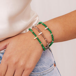 Elegant Malachite healing bracelet worn on wrist.