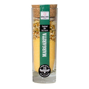 Margarita cocktail mix in a tall glass bottle with citrus peel and cane sugar layers.