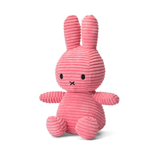 Angled: Adorable Miffy bunny plush in soft corduroy, featuring a bubblegum pink colour and signature big long ears.