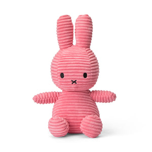 Straight On: Super soft Miffy bunny crafted from corduroy fabric. This bubblegum pink plush toy features Miffy's iconic black eyes and embroidered smile.