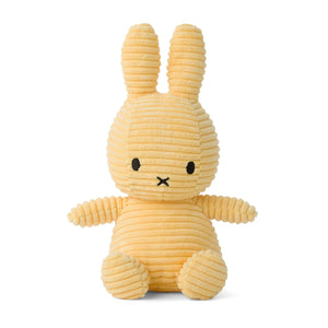 Straight On: Cuddly Miffy bunny crafted from luxurious buttercream corduroy. This plush toy features Miffy's classic design with black embroidered eyes.