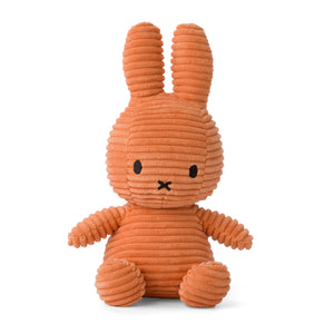 Straight On: Cuddly Miffy Bunny Corduroy Pumpkin crafted from corduroy in a festive pumpkin orange. This plush toy features Miffy's iconic black eyes and her signature upright ears.