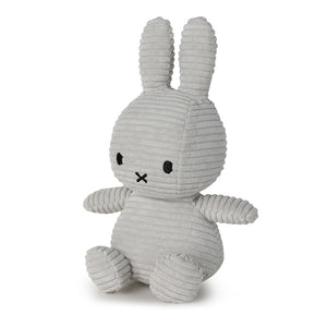 Angled: Soft and cuddly Miffy Bunny Corduroy Soft Grey plush in a timeless soft grey corduroy.