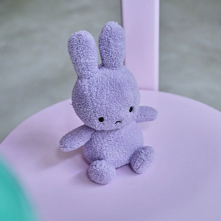Miffy terry lilac plush on pink children's chair in nursery setting