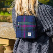Baird Check Harris Tweed mini backpack worn by model - lifestyle shot.