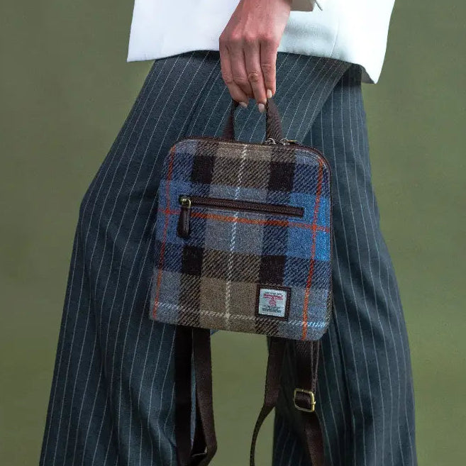 Blue And Brown Check Harris Tweed mini backpack worn by model - lifestyle shot.
