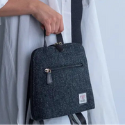 Charcoal Harris Tweed mini backpack worn by model - lifestyle shot.