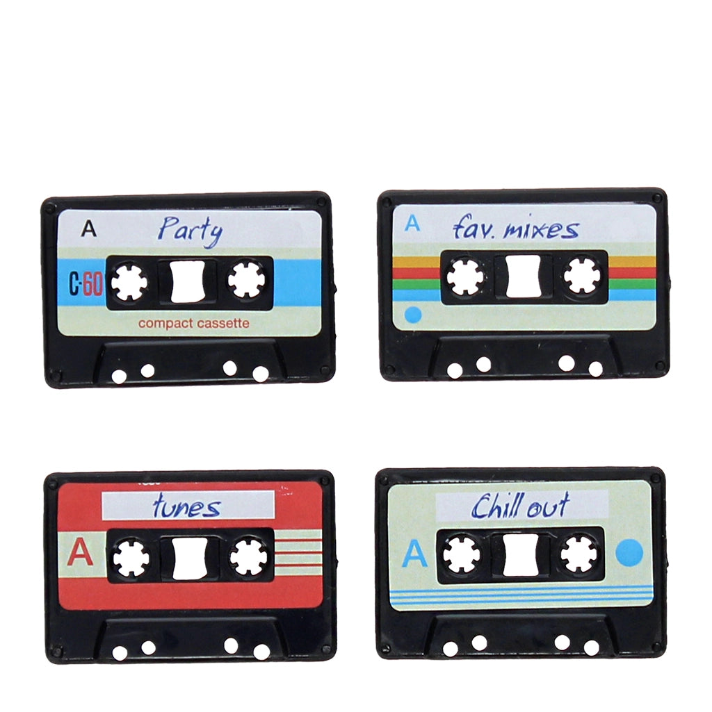 Close-up of retro cassette magnets with handwritten labels “Party”, “Fav Mixes”, “Tunes”, and “Chill Out”