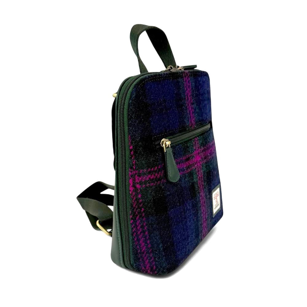 Baird Check Harris Tweed mini backpack side view showing zip pocket on white background.