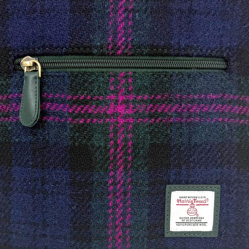 Close-up of Baird check Harris Tweed check texture and label.