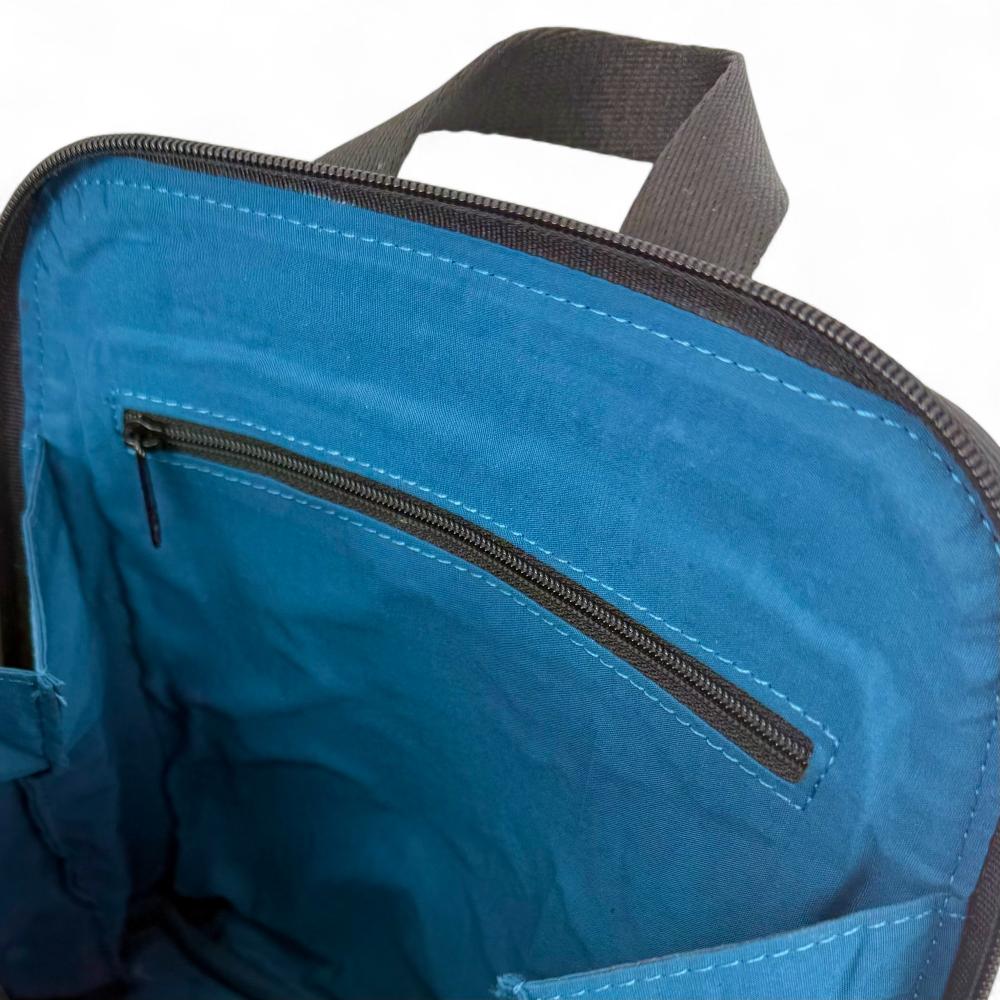 Blue And Pink Check Harris Tweed mini backpack interior showing slip pockets and compartments.