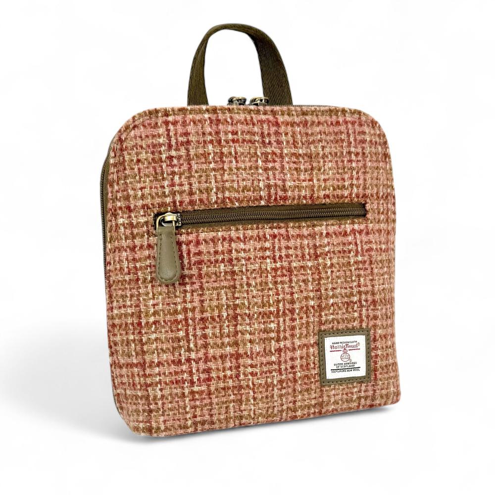 Maple Harris Tweed mini backpack front angled view on white background.