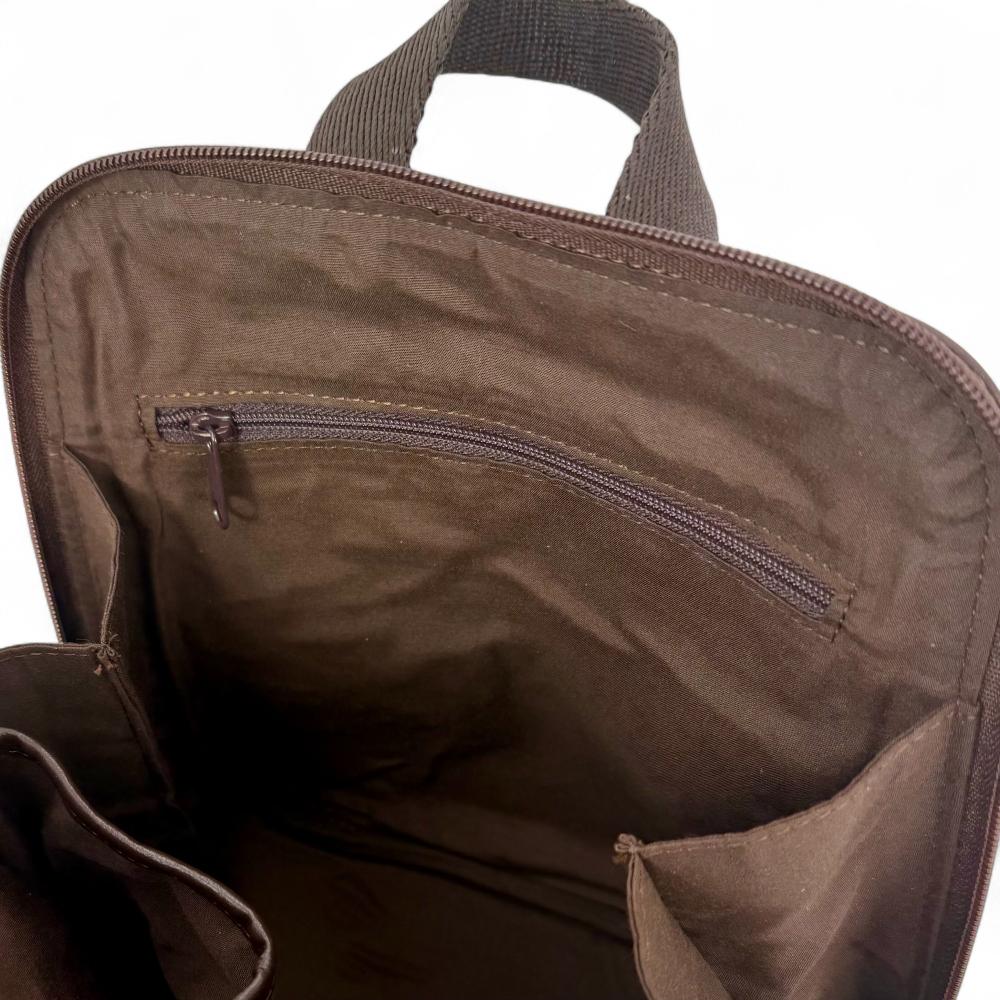 Blue And Brown Check Harris Tweed mini backpack interior showing zip pocket and lining.
