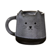 Mojave Cat Mug by Sass & Belle in hand-finished stoneware with cute cat face and 3D ears, brown and beige glaze, 420ml capacity.