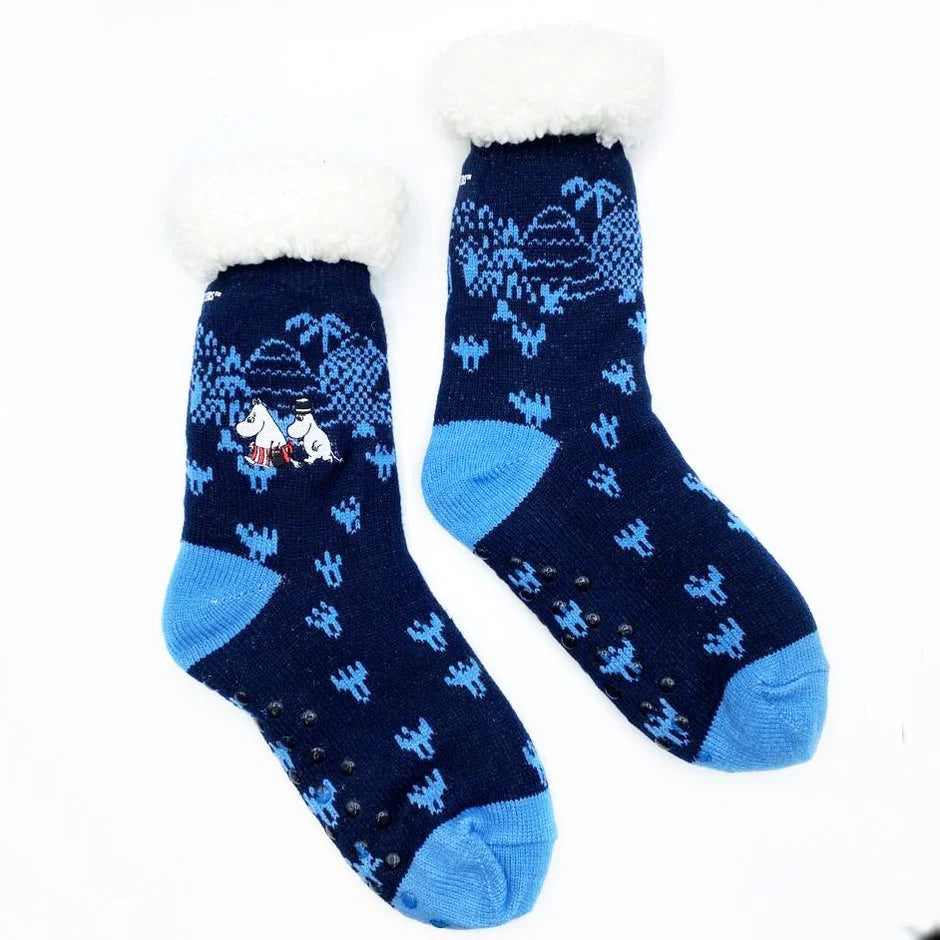 Side view of fluffy Moomin slipper socks with forest knit and embroidered details