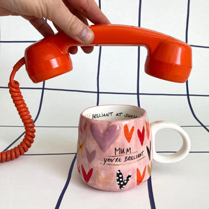 Ceramic mug with hearts and “Mum you’re brilliant” quote – A colourful ceramic mug with a heart design and cheeky message.