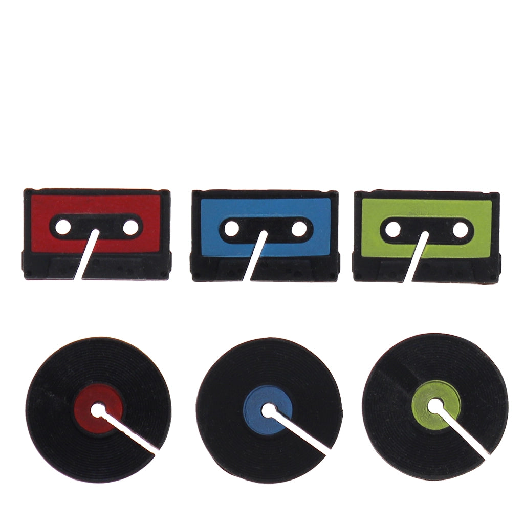 Close-up of individual record and cassette drinks markers in red, blue, and green colours.
