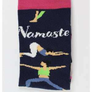 Close-up of folded navy bamboo socks showing “Namaste” lettering and yoga pose design – sustainable women’s socks for yoga lovers.