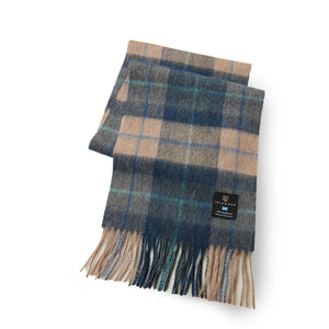 Navy and beige tartan lambswool scarf with fringed edges neatly folded.