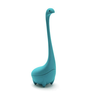 Blue Baby Nessie tea infuser standing upright, shaped like a cute dinosaur with a long neck and small legs.