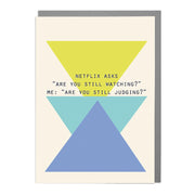 Humorous Netflix Judgment greeting card featuring bold geometric triangles in blue, teal, and yellow with the quote “Netflix asks ‘Are you still watching?’ Me: ‘Are you still judging?’”.