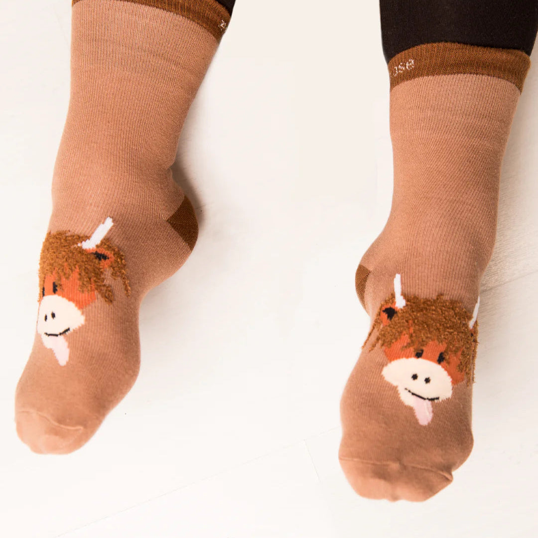 Matching Neutral Highland Cow Socks for kids and adults, featuring Scottish-inspired design