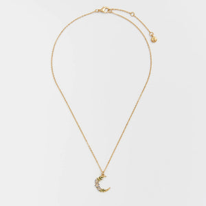 Nightshade Moon Gold Chain Necklace laid flat with crescent moon floral pendant.