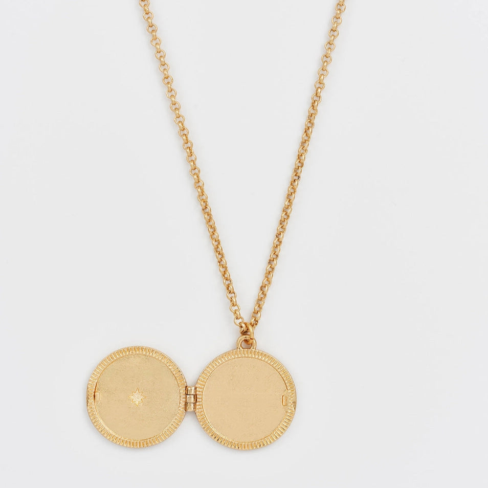 Open Nightshade Moon Round Gold Locket showing inside detail.