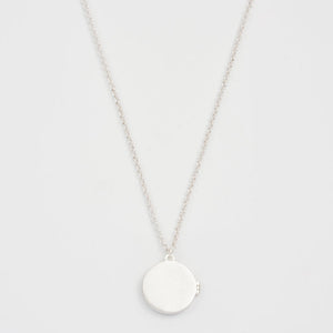Back view of Nightshade Moon Round Silver Locket on chain.