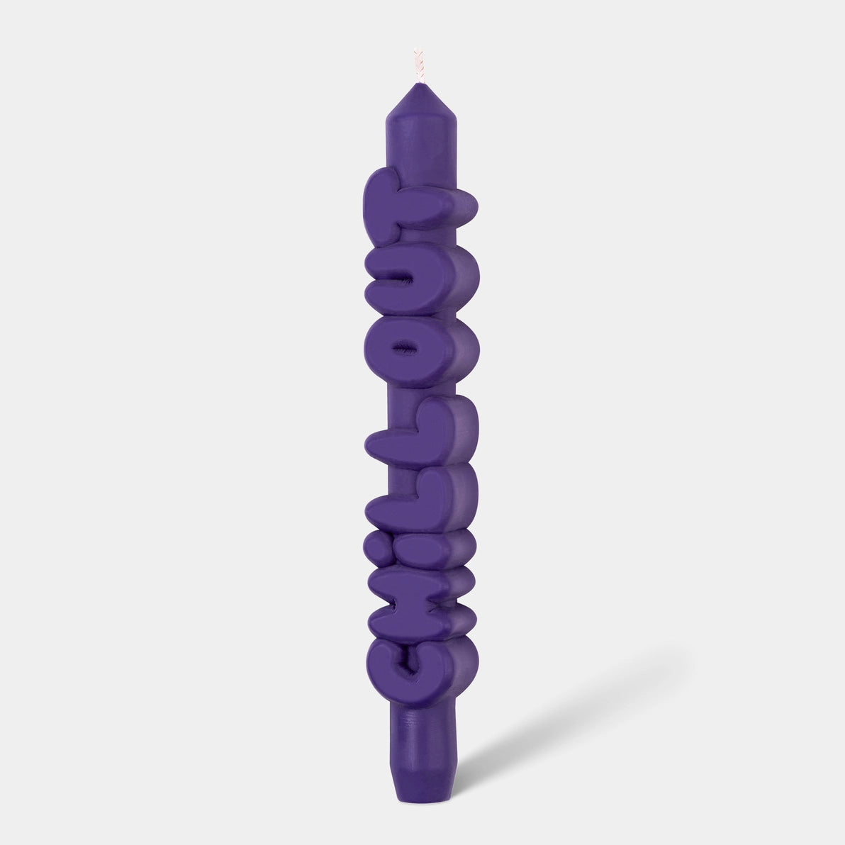 Front view of indigo Nine Inch Chill Out Candle with bold playful lettering and pointed tip, handmade from soy and paraffin wax.