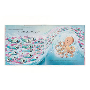 Pages from Odell’s Amazing Arms picture book showing Odell the octopus surrounded by a school of curious fish in a bright ocean illustration.