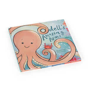 Angled view of Odell’s Amazing Arms hardback children’s book featuring Odell the octopus and a red crab on the ocean-themed cover.