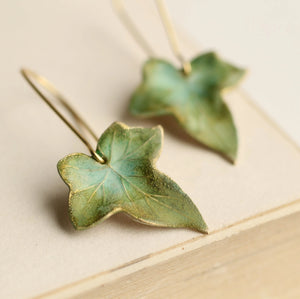 Close-up of handcrafted Olive Green Ivy Leaf Earrings, showing delicate detailing and rich olive green hues with a nature-inspired design.