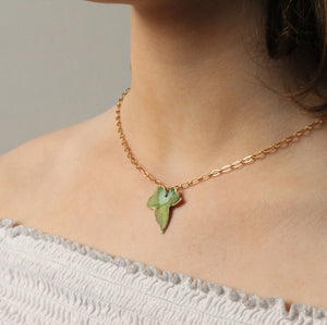 Model wearing the Olive Green Ivy Leaf Necklace, showcasing its elegant 18-inch chain.