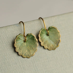 Close-up of handcrafted Olive Willow Leaf Earrings, showing intricate brass detailing and natural multi-toned green colouring.