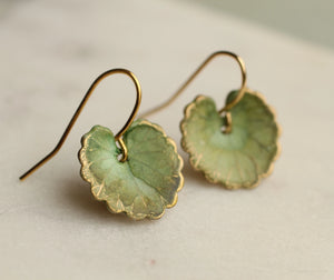 Elegant nature-inspired olive green earrings with gold-toned edges, handcrafted in Edinburgh.