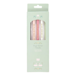 Mint green gift box containing five pastel book-themed pencils with quotes.